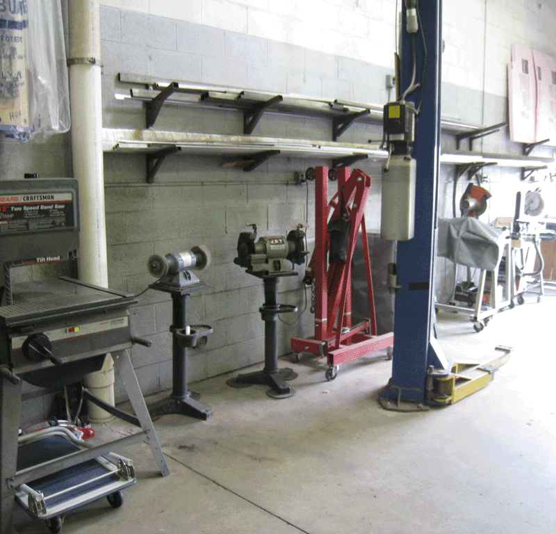 Press brake, drill press, and saws in the Shelby Trim machine shop.