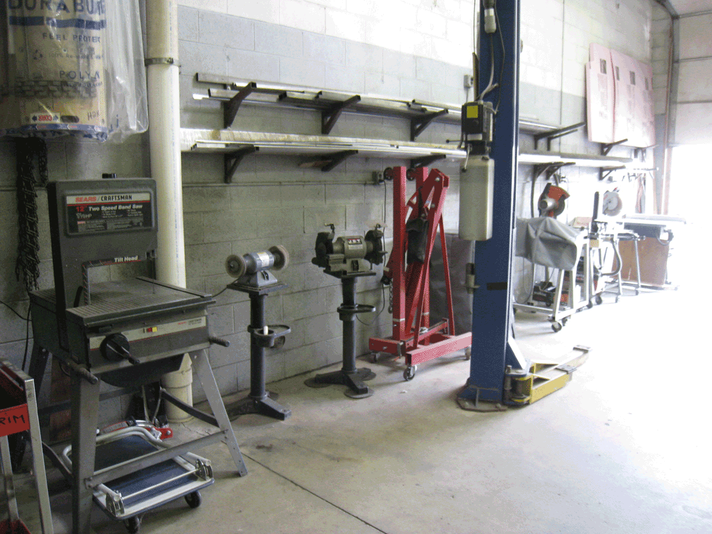 Press brake, drill press, and saws in the Shelby Trim machine shop.