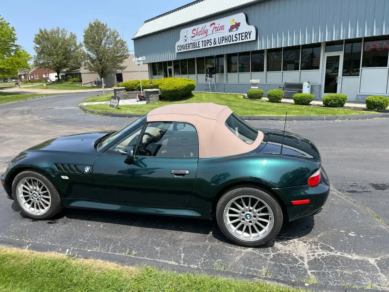 New green canvas convertible top fitted on a BMW by Shelby Trim.